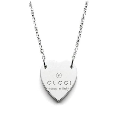 heart necklace with gucci trademark gold